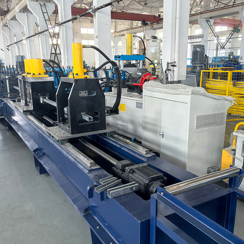 Máquina formadora de rollos con soporte fotovoltaico hidráulico de punzonado y corte posterior