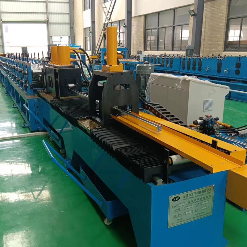 Máquina formadora de rollos con soporte fotovoltaico hidráulico de punzonado y corte posterior